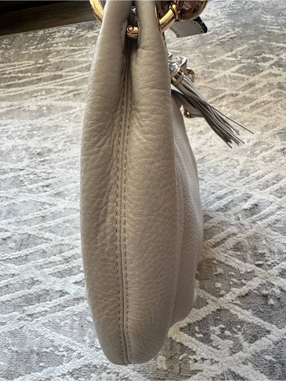 Michael Kors Cream Pebbled Leather Shoulder Hobo with Tassel and Gold Hardware